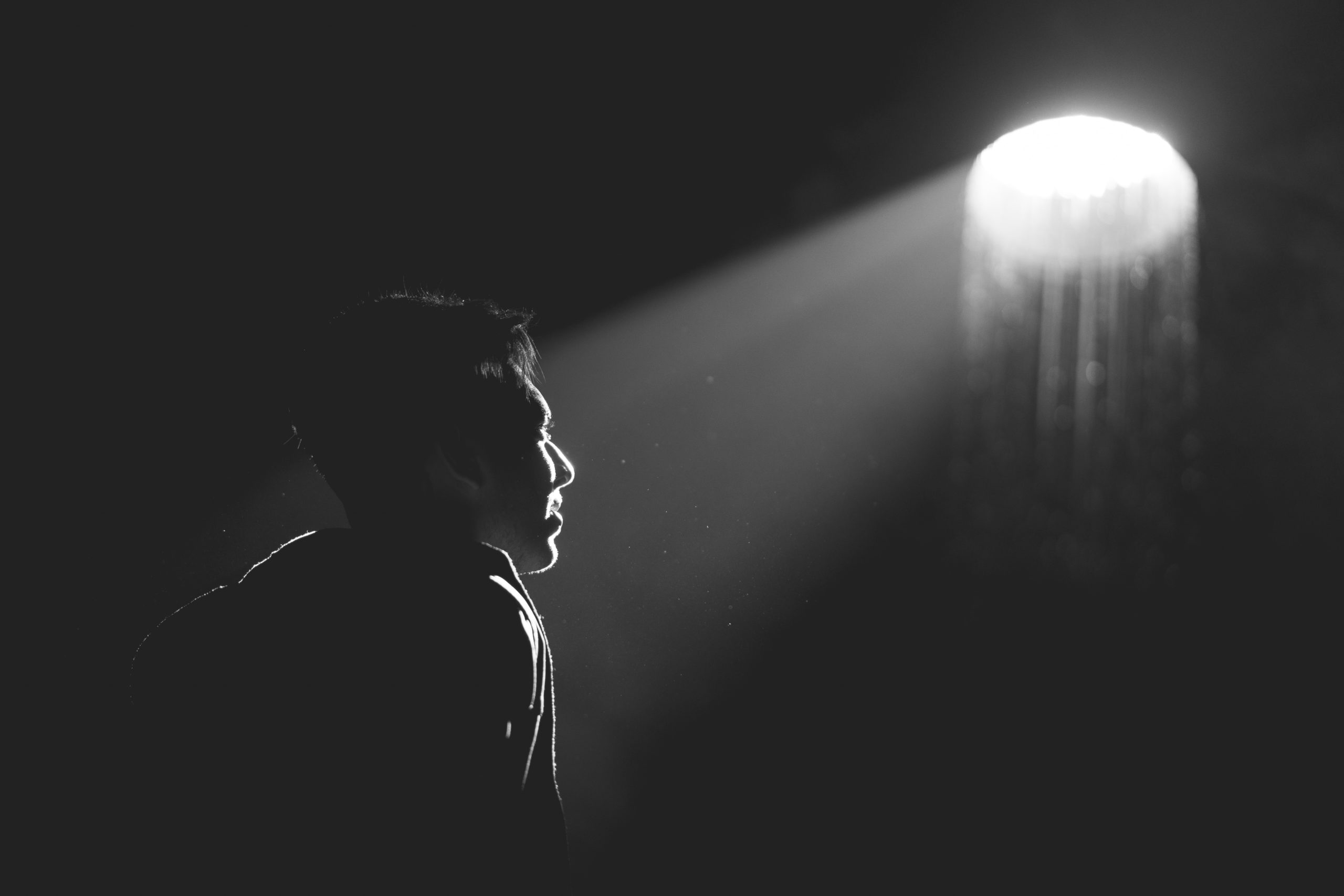 Photo by Ahmed Hasan grayscale photography of man